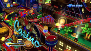 A pinball section on the building in front of the main piinball table.