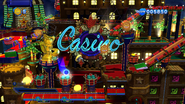 A pinball section on the building in front of the main piinball table.
