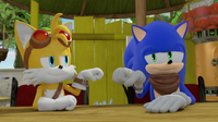Sonic and Tails fist bump