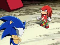 Knuckles wonders why Sonic is touching his forehead