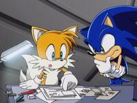 Tails and Sonic going over blueprints