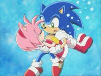 SX76 Sonic holding Amy