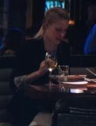Unknown actress as Restaurant Patron