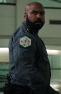 Diesel Madkins as Lab Security Guard