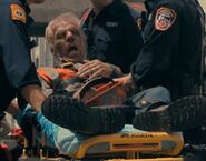 Unknown actor as Injured Old Man