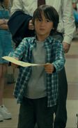 Yuma Feldman as Julia's Half Sibling