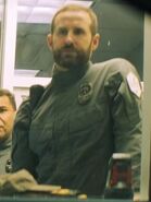 Lucas Fleischer as Guard at Gate