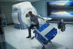 Eddie freaking out near an MRI machine promotional still