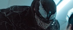 Venom grinning promotional still