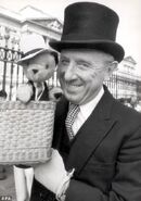 Harry Corbett at Buckingham Palace, collecting his OBE