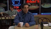 Richie sits at the table in Beansie's pizza parlor, waiting for his veal parm sandwich, as he starts planning his next move against Tony.