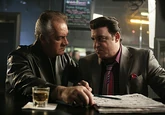 Silvio next to Paulie, after learning of the failed hit on Phil Leotardo, in the episode The Blue Comet