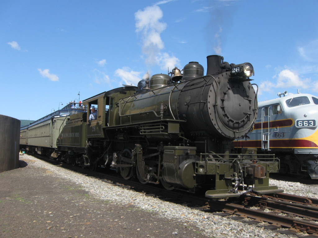 The thunderous roar of steam locomotive, billowing smoke and transporting  people and goods along winding railway, a reminder of power and beauty of  this majestic train on tracks, AI Generative 31570260 Stock