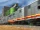 Sound Ideas, TRAIN, FREIGHT - FREIGHT TRAIN: PASS BY, HORN DOPPLER, VERY LOUD TRACK SQUEALS