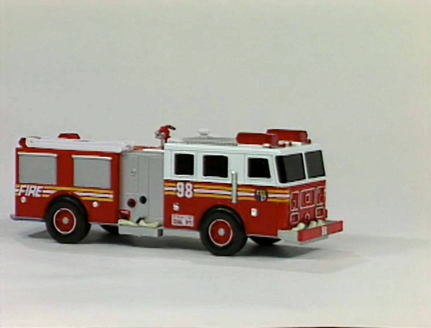 Sound Ideas, FIRE TRUCK PULL UP, HEAD ON, SIREN, AIR HORN