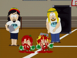 The PETA members throwing red liquid on two members of the Cheerleading squad, Red and Annie.