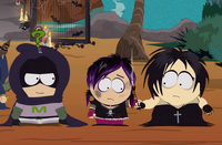 Henrietta offers Karen her cigarette holder so the latter can become goth.