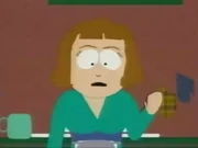 Mme. Tweak dans la cuisine de sa maison.