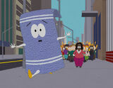 Towelie runs from an angry mob amassed by Oprah.