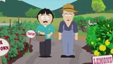Le fermier marchant avec Randy dans sa ferme.