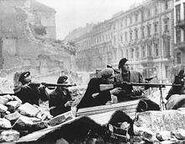 Polish resistance fighters during the Warsaw Uprising, 1944. The Wz. 28 seen here is likely a survivor of the September Campaign.