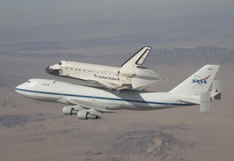 Space Shuttle Atlantis piggybacking the Shuttle Carrier Aircraft (SCA) ferries space shuttle Atlantis back to the Kennedy Space Center after landing at NASA's Dryden Flight Research Center at Edwards Air Force Base.
