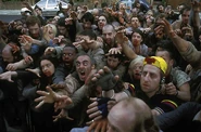 Tyres, SotD.jpg (76 KB) Tyres (bottom right, yellow cap) amongst the horde of zombies in Shaun of the Dead.