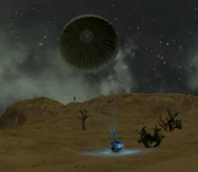 A cargo drop falling with an opened parachute