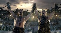 Varro and  celebrate a victory in the arena.