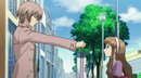 Yashiro handing over something to Megumi