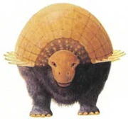 Ankylosaur armor, consisting of mostly scutes and nodules, with large spines in some cases, evolved as a defensive mechanism. In the taranter it has become more important as a means of conserving moisture. Hollows inside the skull are lined with damp membranes that moisten the dusty air as it is breathed in. Defensive armor is still present as horny spikes along the flanks and the heavy club on the tail.