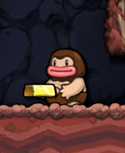 A Caveman carrying a gold ingot