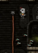 A player hitting a mummy under them by doing a high jump and their whip.