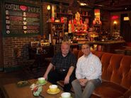 John Semper Jr. and his friend, Michael Pingree in the coffee shop set of Friends