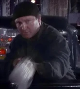 Unknown actor as Car Jacker #2