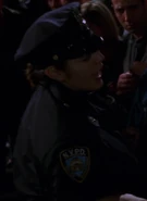 Sara Ramirez as Cop at Carjacking