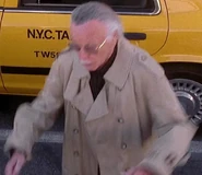 Stan Lee as Man Dodging Debris