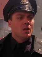 Myk Watford as Cop at Fire