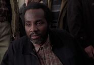 Rickey G. Williams as Train Passenger