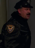 Timothy Patrick Quill as Wrestling Arena Guard