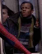 Phil LaMarr as Train Passenger