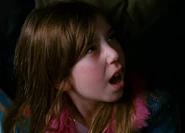 Emma Raimi as Girl with Camera