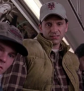 Peter Allas as Train Passenger