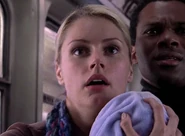 Brianna Brown as Train Passenger