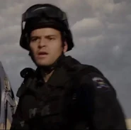 Alexander Bendria as Officer (SWAT)