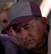 Timothy Patrick Quill as Train Passenger