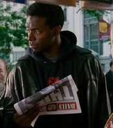 Dean Edwards as Newsstand Patron