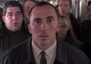 Tony Campisi as Train Passenger