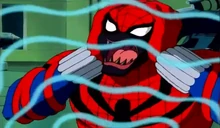 Spider-Carnage siendo aturdido por una granada sónica