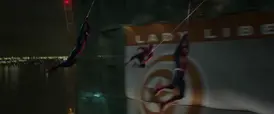 Three Spider-Men swinging